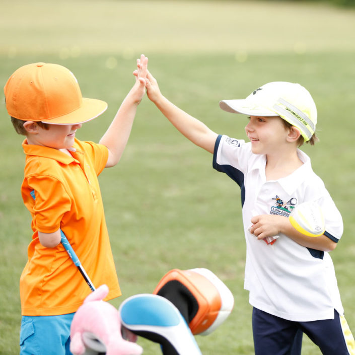 golfers-high-five